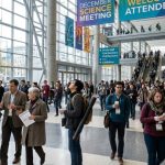 Scientists walking through the Moscone Center in San Francisco during the AGU Fall Meeting 2026
