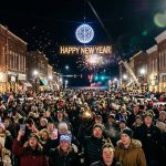 Crowd gathered at Ludington downtown for New Year's Eve ball drop with fireworks over Lake Michigan at midnight