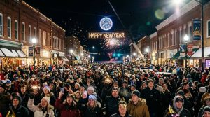 Crowd gathered at Ludington downtown for New Year's Eve ball drop with fireworks over Lake Michigan at midnight